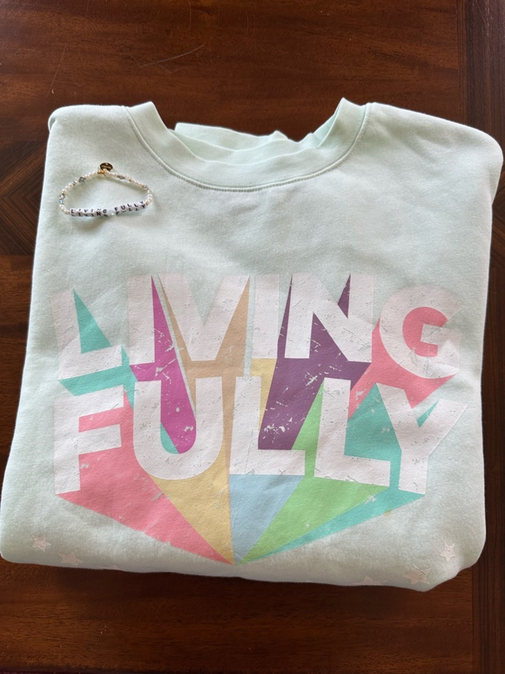 Living Fully Co Mallory Irvin brand new size medium sweatshirt and bracelet.